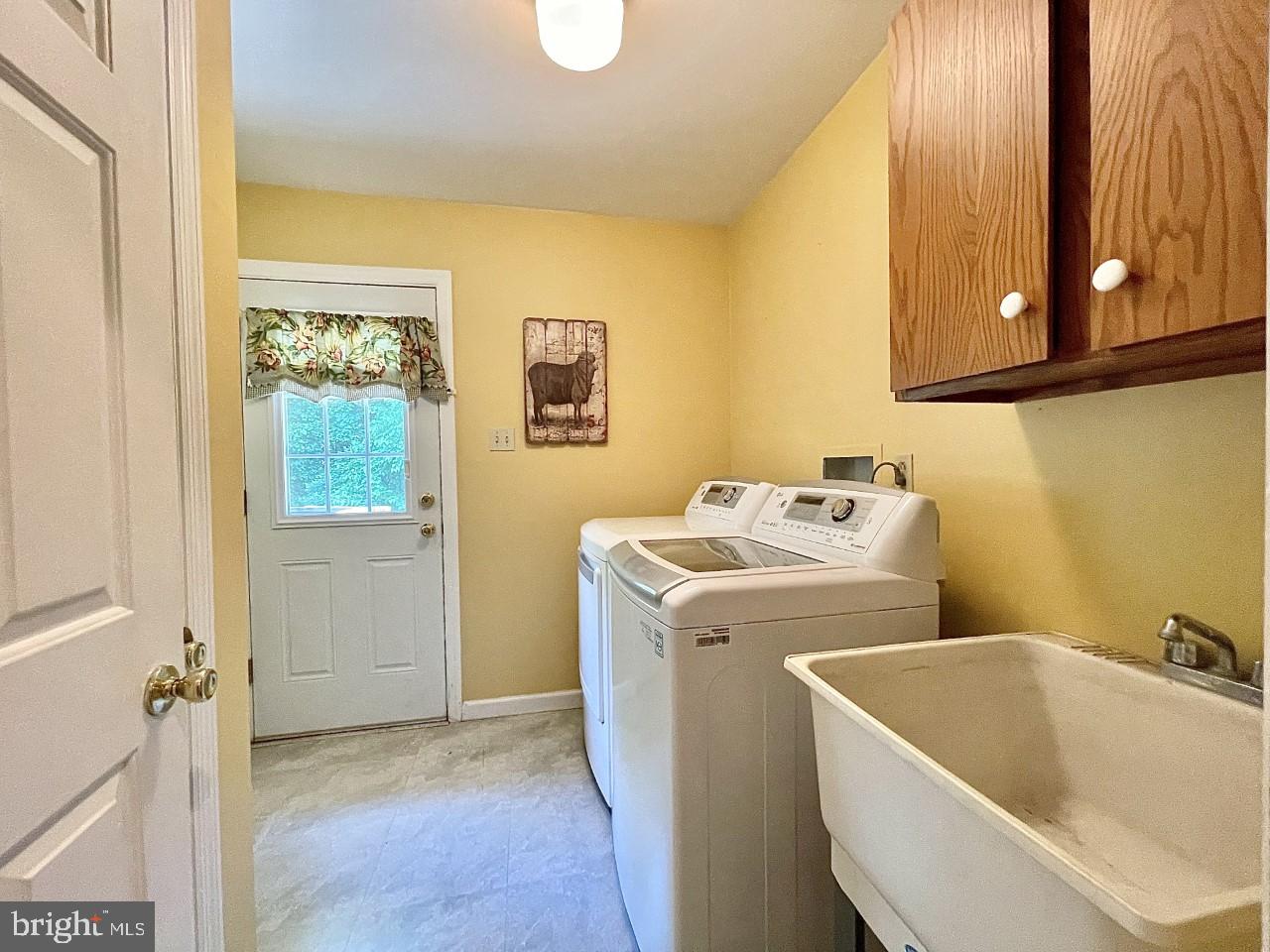 26 Raphael Road Hockessin, DE 19707 - Photo 14 of 28 Utility Room with Door to Deck & Hot Tub