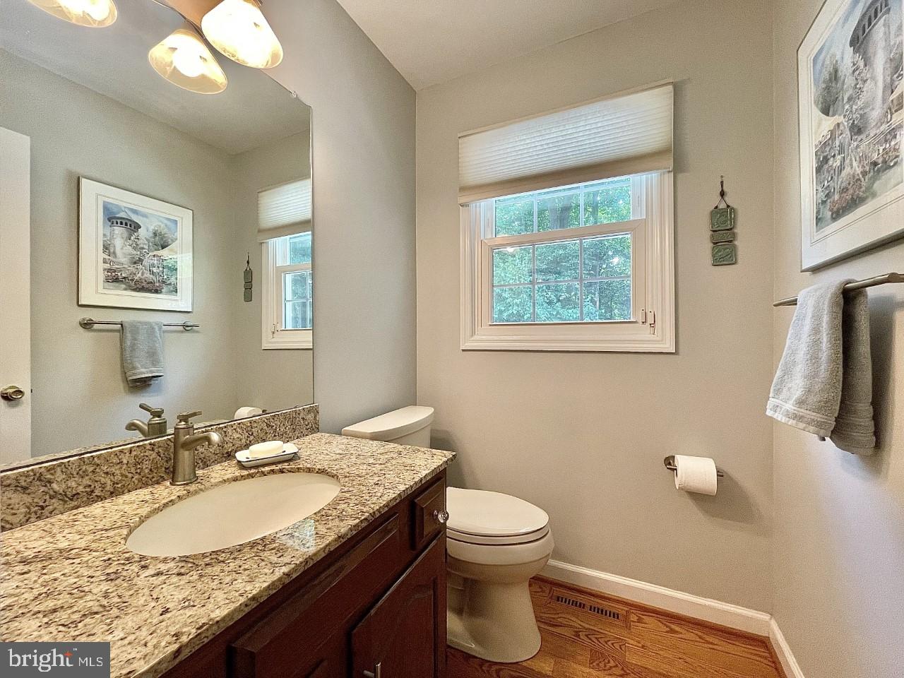 26 Raphael Road Hockessin, DE 19707 - Photo 15 of 28 Upgraded Powder Room with Hardwood Flooring