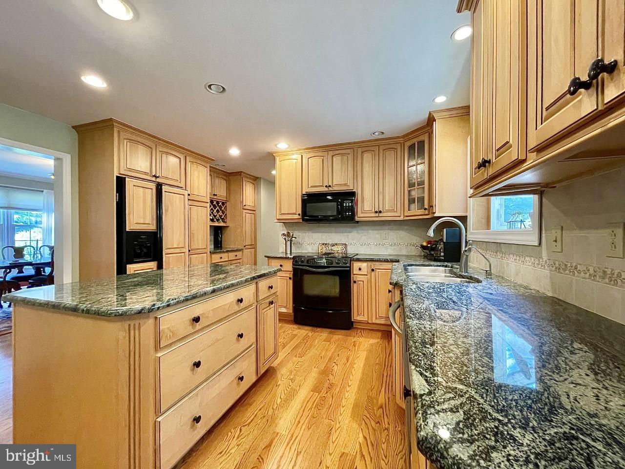 26 Raphael Road Hockessin, DE 19707 - Photo 3 of 28 Kitchen - Granite Countertops & Recessed Lighting