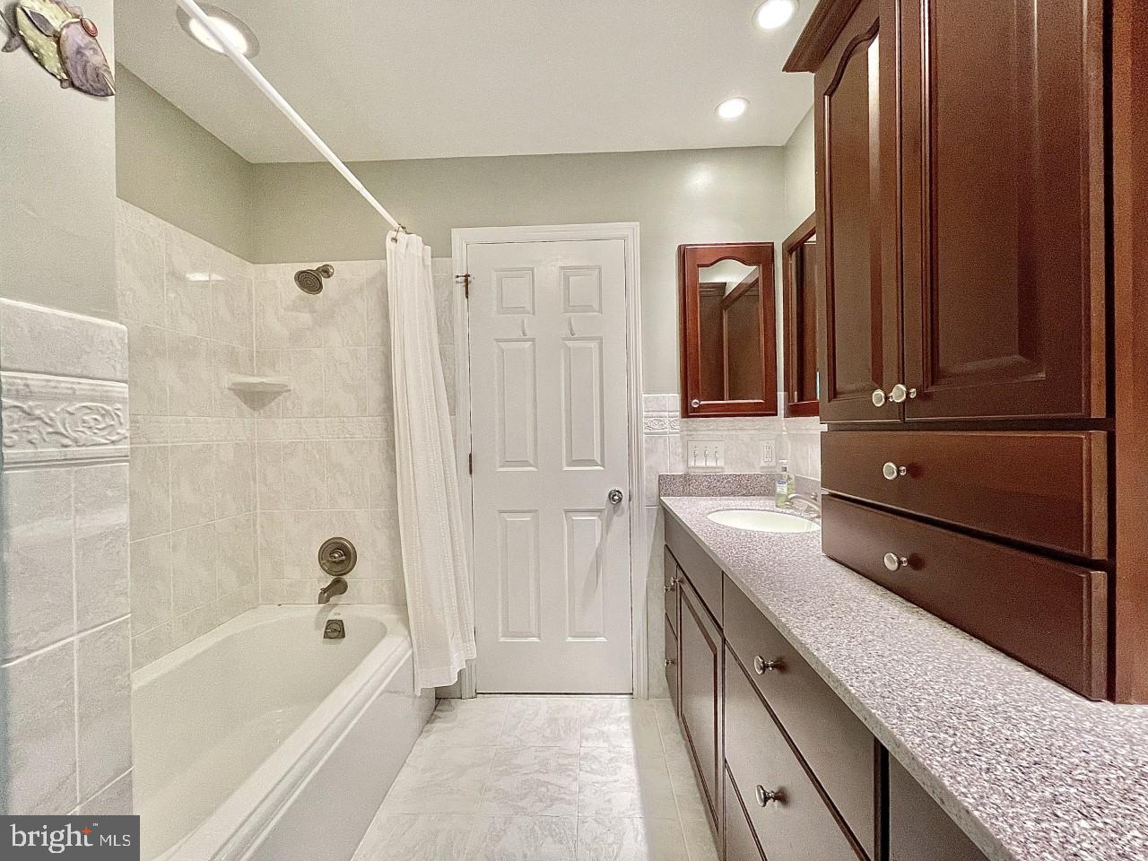 26 Raphael Road Hockessin, DE 19707 - Photo 22 of 28 Upgraded Hall Bath with Tile Flooring