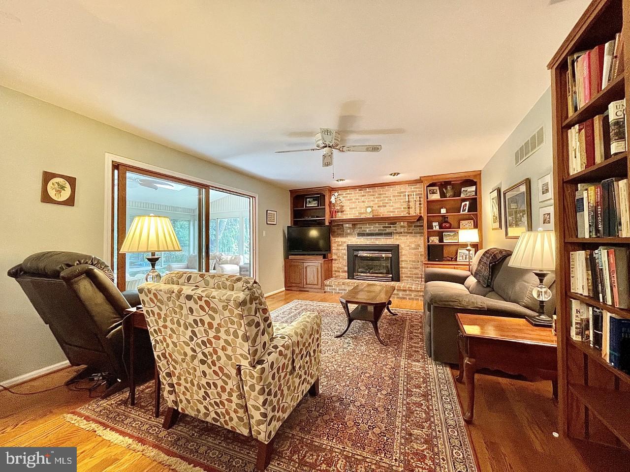 26 Raphael Road Hockessin, DE 19707 - Photo 7 of 28 Family Room - Gas Fireplace & Built-In Bookcases