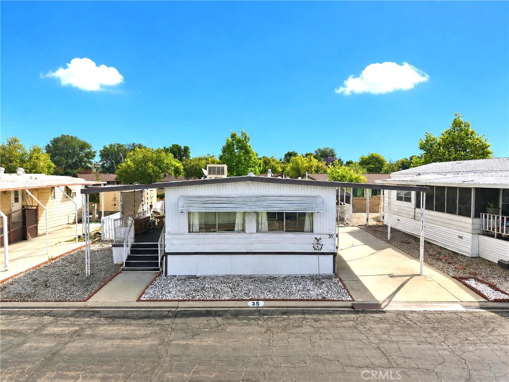 9391 California Avenue, Unit 35 Riverside, CA 92503 - Photo 2 of 32 a view of a house with a patio