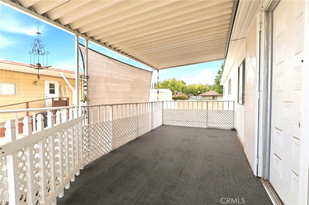 9391 California Avenue, Unit 35 Riverside, CA 92503 - Photo 22 of 32 a view of a porch