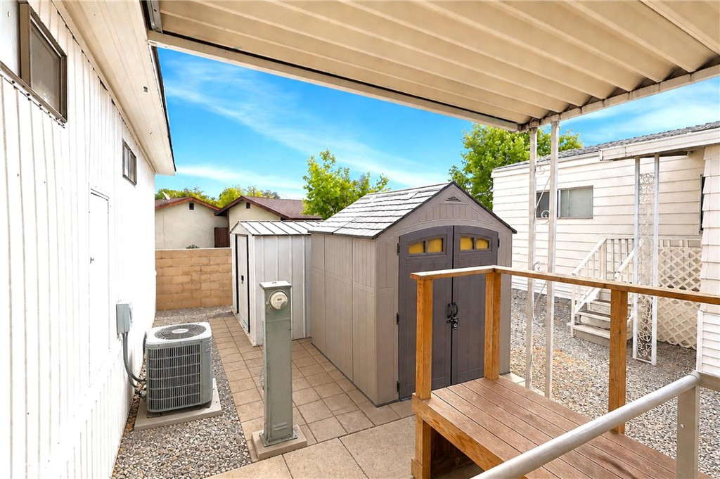9391 California Avenue, Unit 35 Riverside, CA 92503 - Photo 24 of 32 a front view of a house with a yard