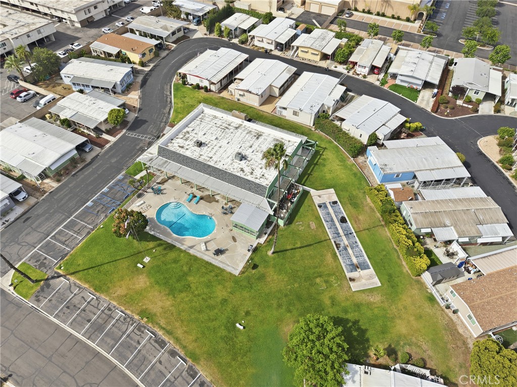 9391 California Avenue, Unit 35 Riverside, CA 92503 - Photo 25 of 32 an aerial view of a residential houses with yard
