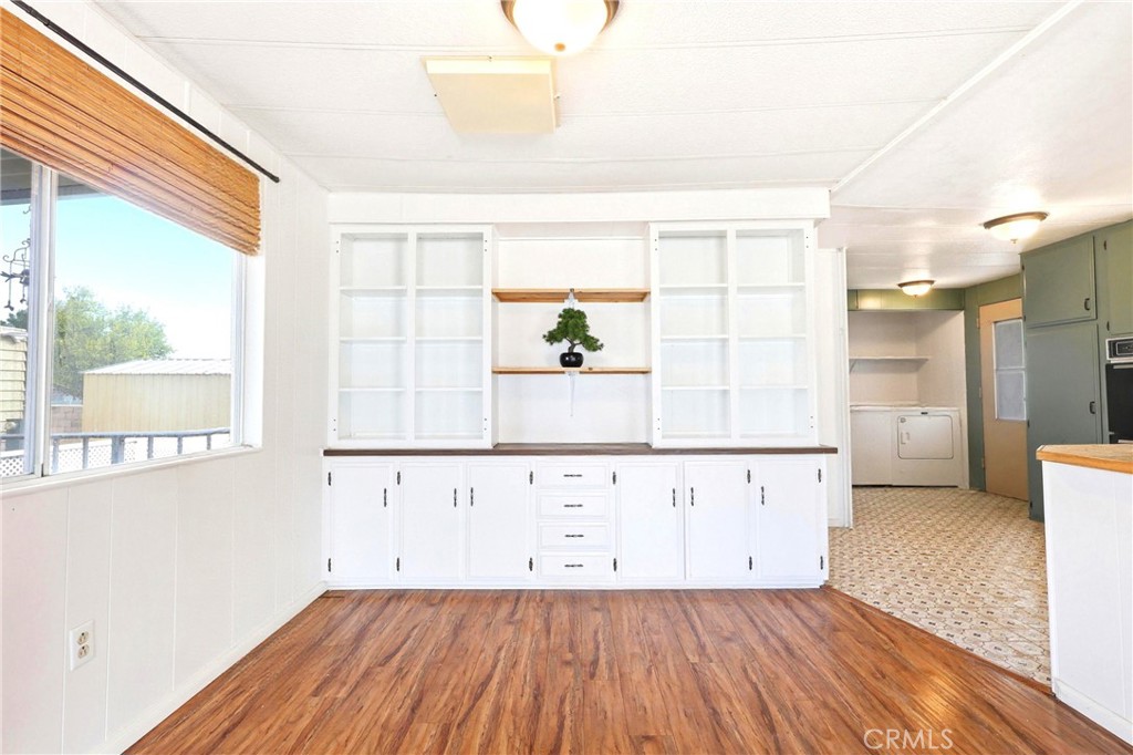 9391 California Avenue, Unit 35 Riverside, CA 92503 - Photo 7 of 32 a view of kitchen with wooden floor