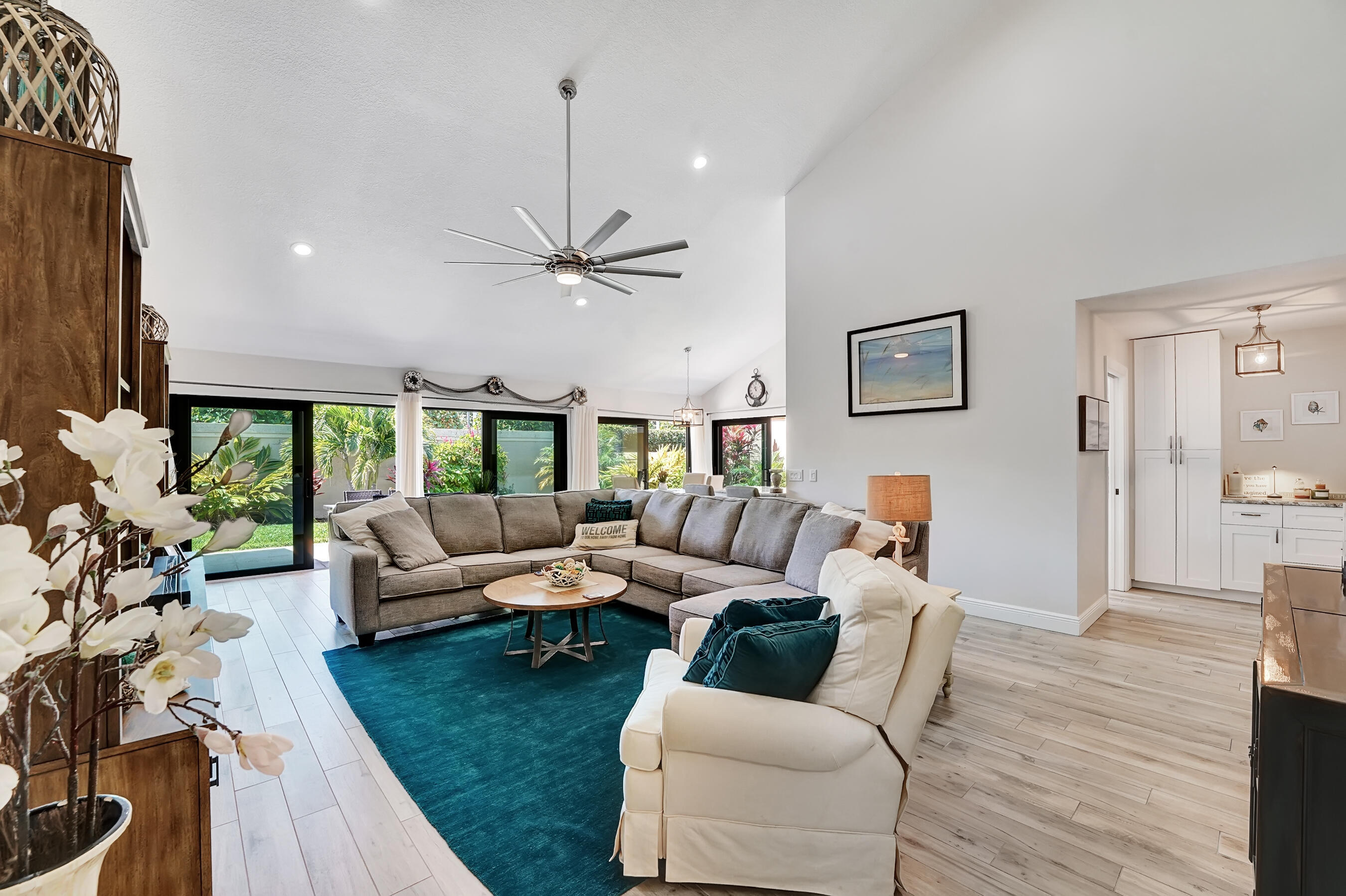 118 Ridge Road Jupiter, FL 33477 - Photo 14 of 27 a living room with furniture and a large window