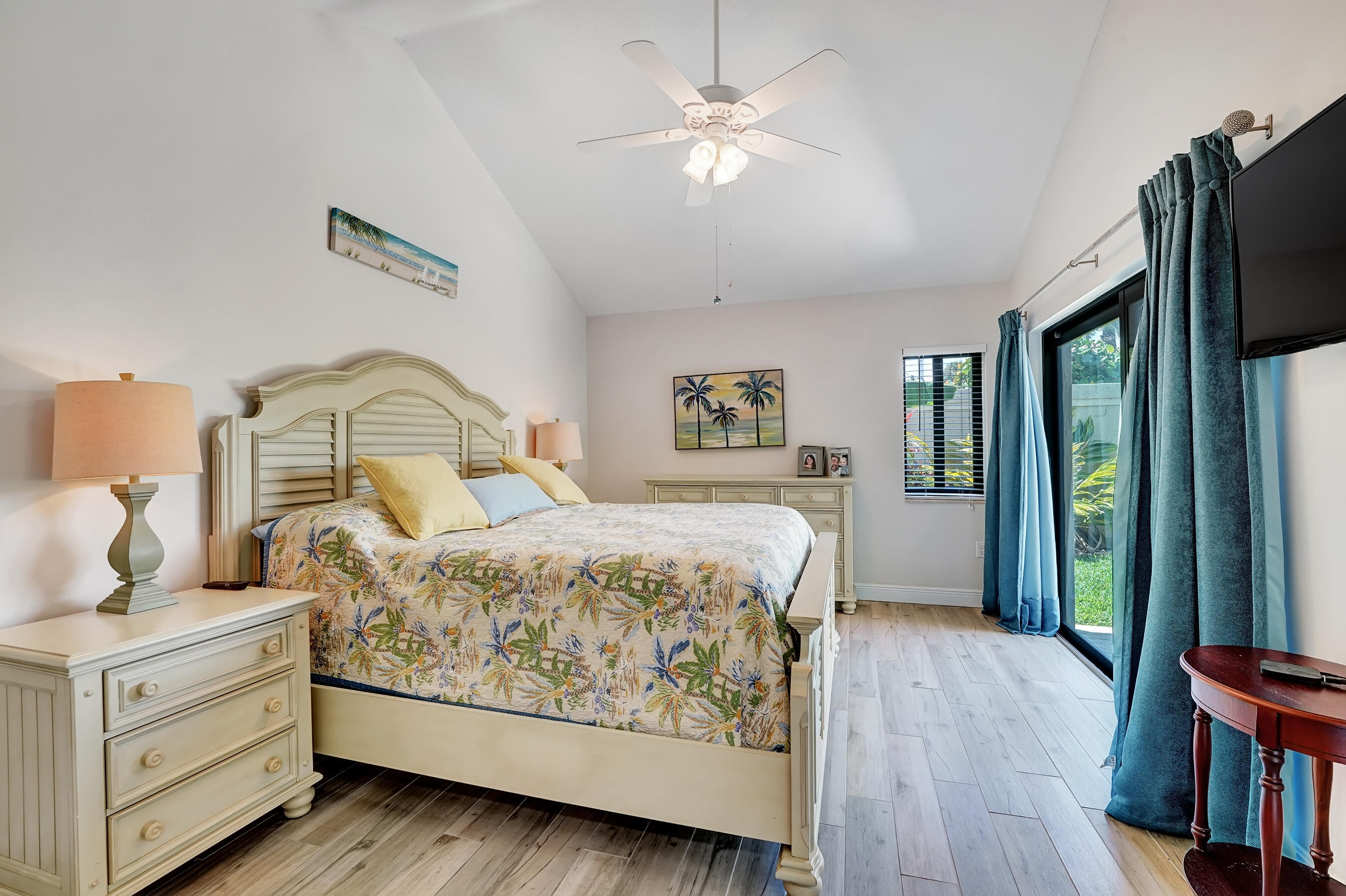 118 Ridge Road Jupiter, FL 33477 - Photo 16 of 27 a bedroom with a large bed and a window
