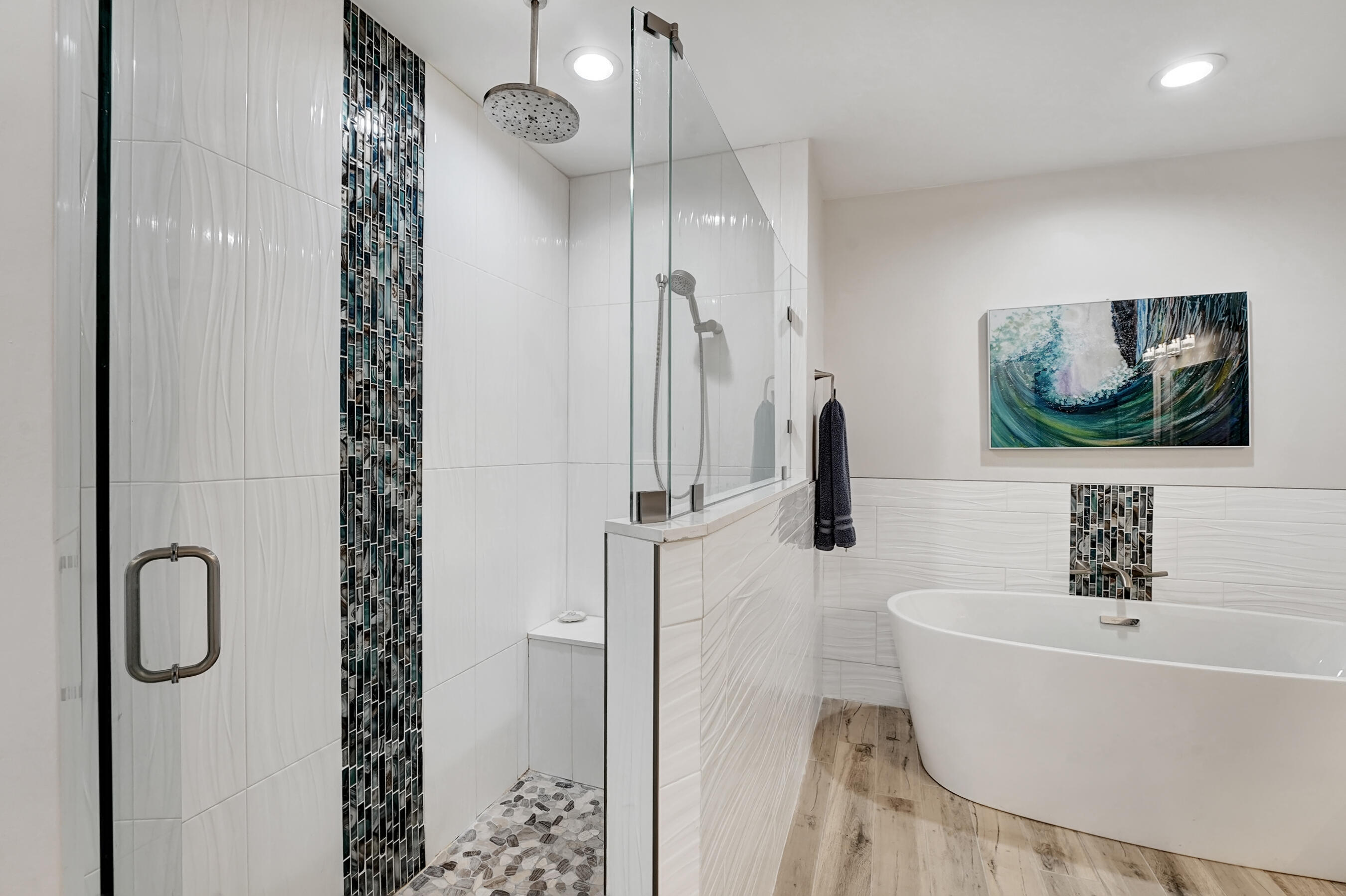 118 Ridge Road Jupiter, FL 33477 - Photo 19 of 27 a bathroom with a bathtub and a shower