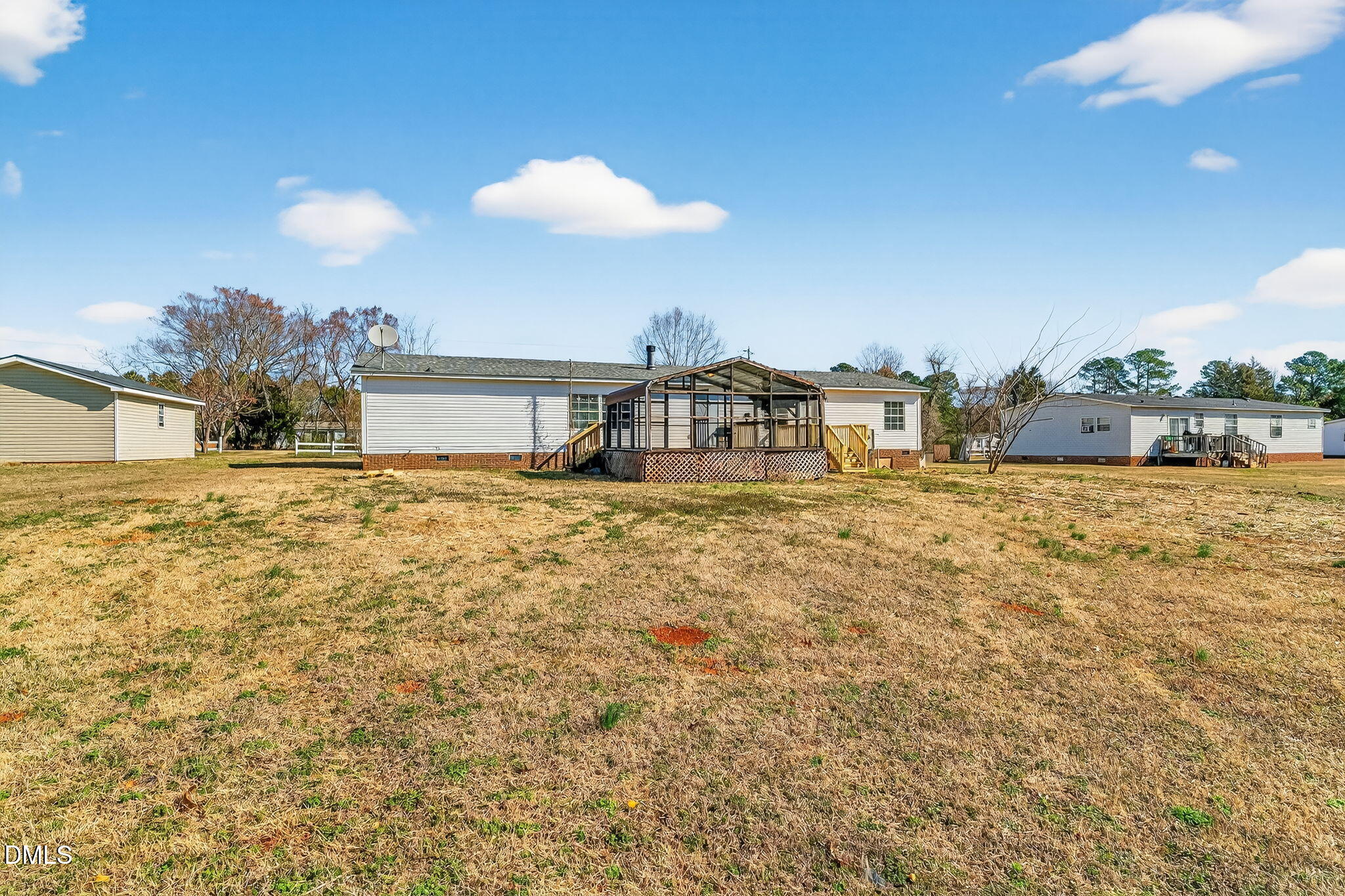 10015 Smith Road Middlesex, NC 27557 - Photo 44 of 48 a view of a house with a yard