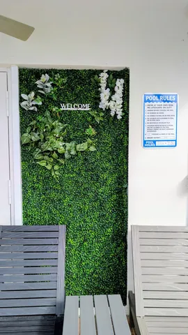 a view of a back yard from a balcony