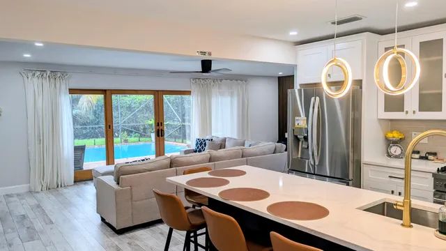 a view of a dining room with furniture window and outside view