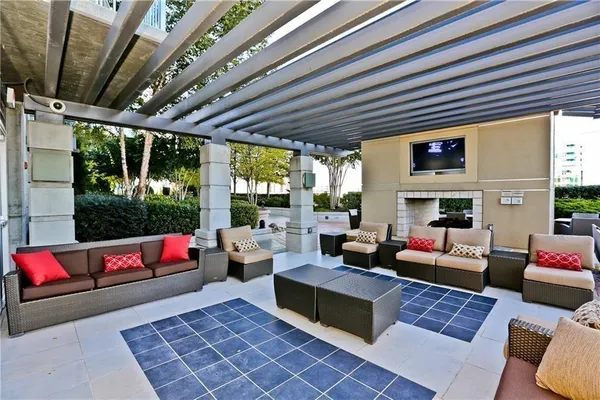 a living room with furniture and a couch