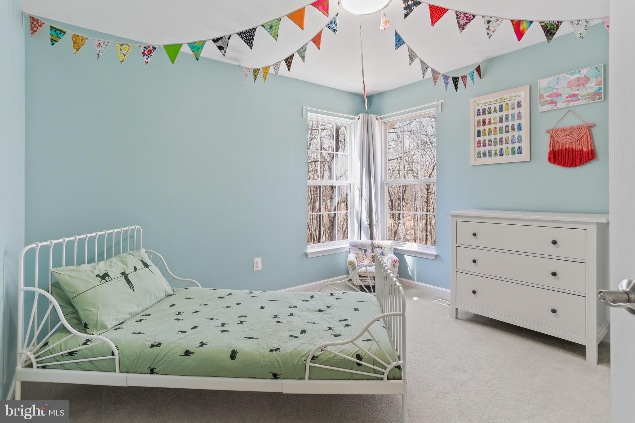 5810 Artisan Drive Eldersburg, MD 21784 - Photo 21 of 39 a bedroom with a bed and a window