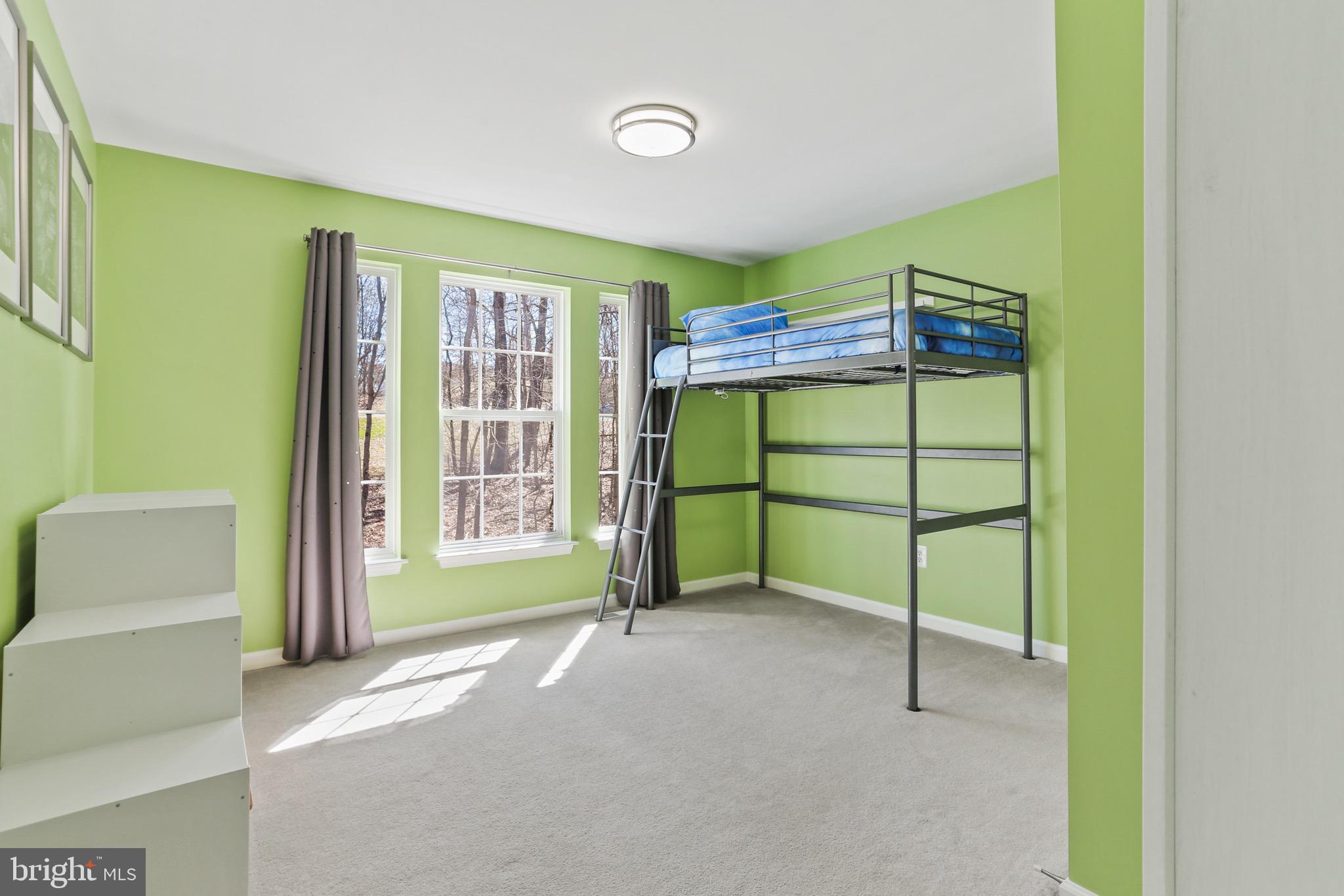 5810 Artisan Drive Eldersburg, MD 21784 - Photo 25 of 39 a bedroom with windows and gate