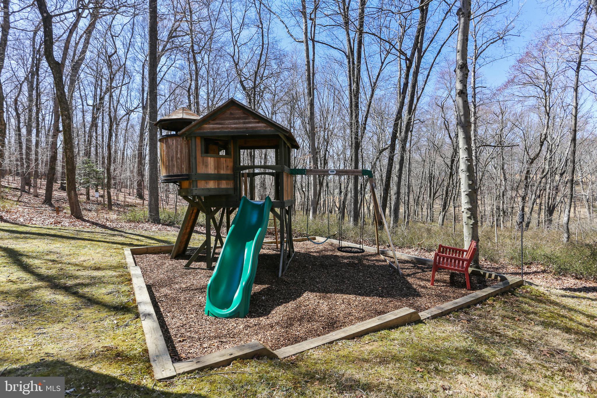 5810 Artisan Drive Eldersburg, MD 21784 - Photo 35 of 39 a front view of a house with garden