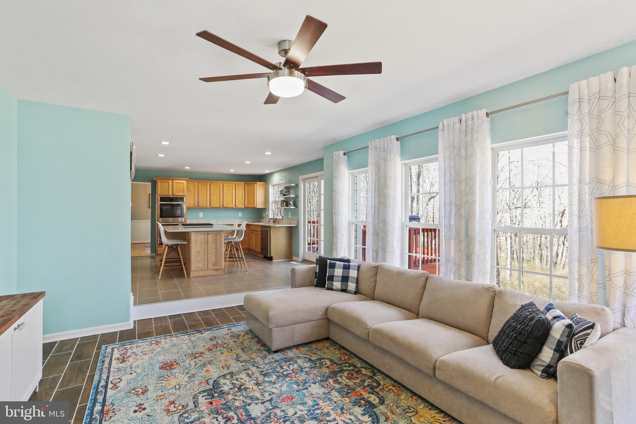 5810 Artisan Drive Eldersburg, MD 21784 - Photo 10 of 39 a living room with furniture and a large window