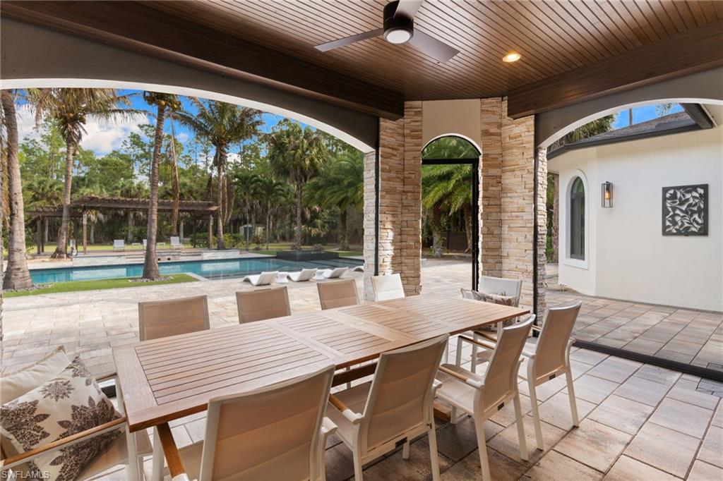 4501 3rd Avenue Southwest Naples, FL 34119 - Photo 41 of 50 Screened patio with summer kitchen