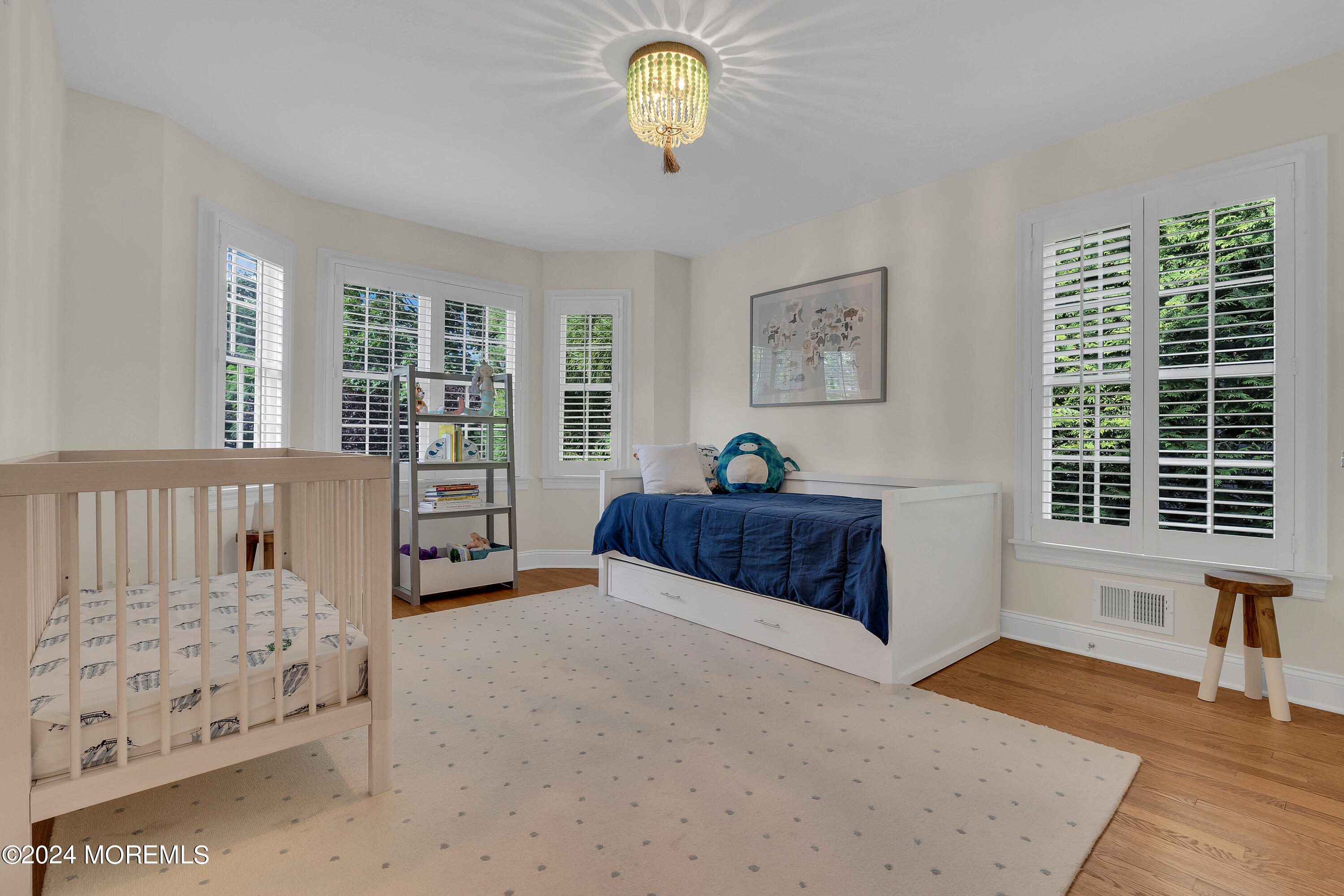 314 Jersey Avenue Spring Lake, NJ 07762 - Photo 21 of 33 a bedroom with furniture and a window