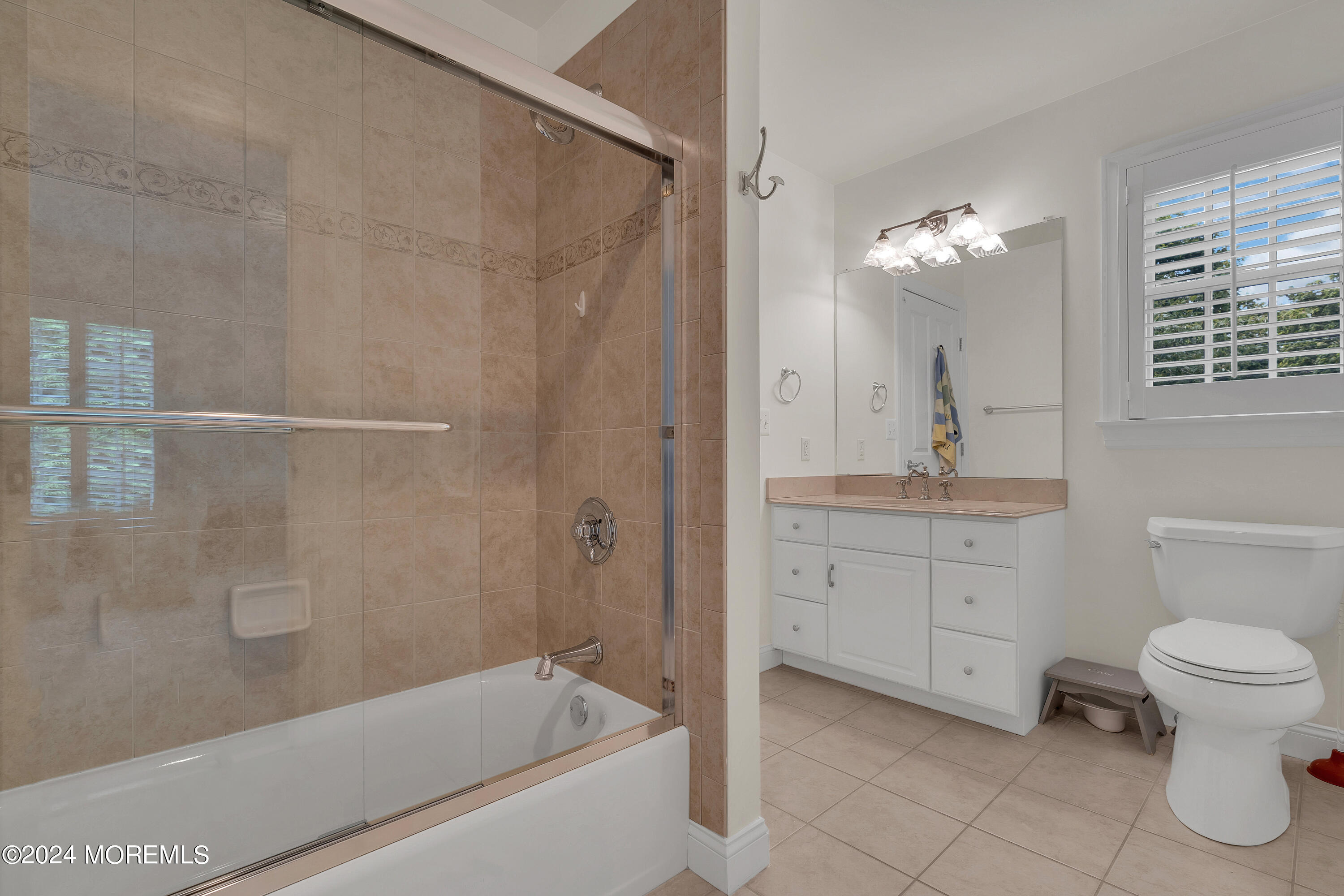 314 Jersey Avenue Spring Lake, NJ 07762 - Photo 23 of 33 a bathroom with a sink a toilet and shower