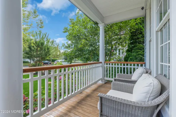a view of a chair in a balcony