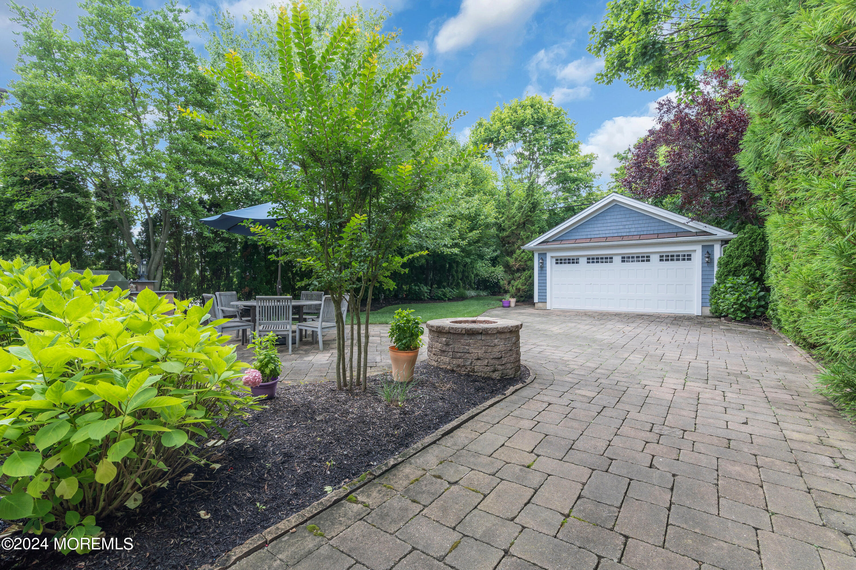 314 Jersey Avenue Spring Lake, NJ 07762 - Photo 32 of 33 a front view of a house with garden
