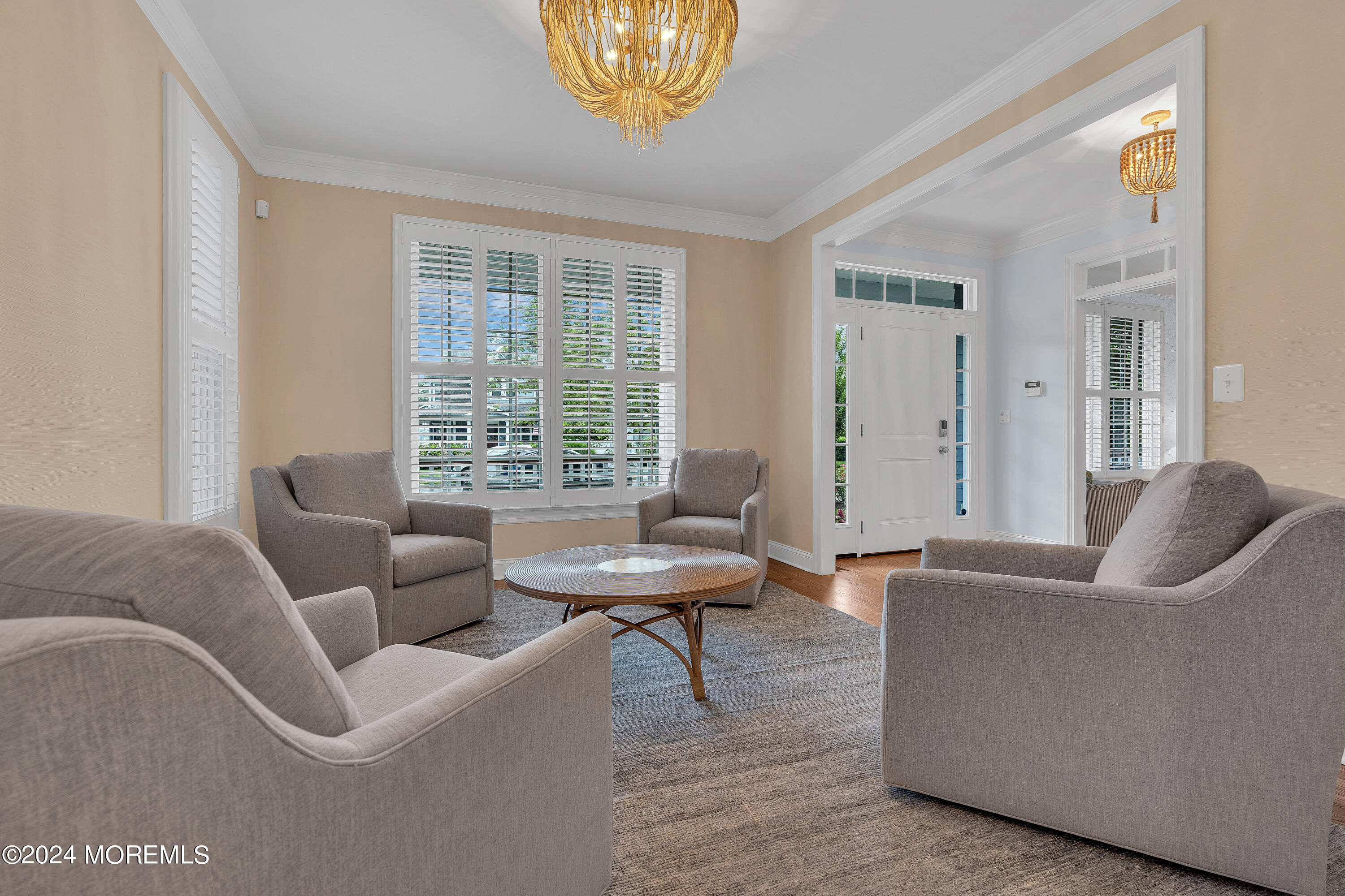 314 Jersey Avenue Spring Lake, NJ 07762 - Photo 6 of 33 a living room with furniture and a large window