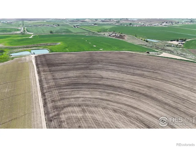a view of an ocean and city
