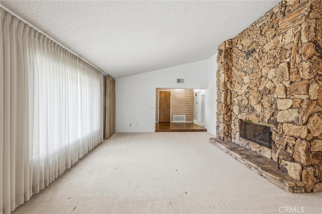 37295 Oak View Road Yucaipa, CA 92399 - Photo 9 of 59 a view of empty room with fireplace