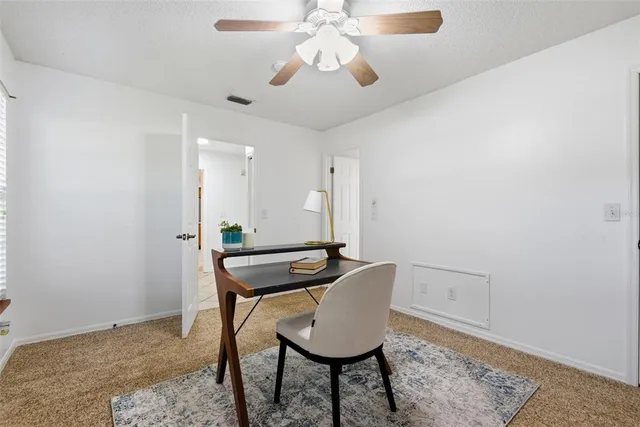 a view of a golf course with a lake