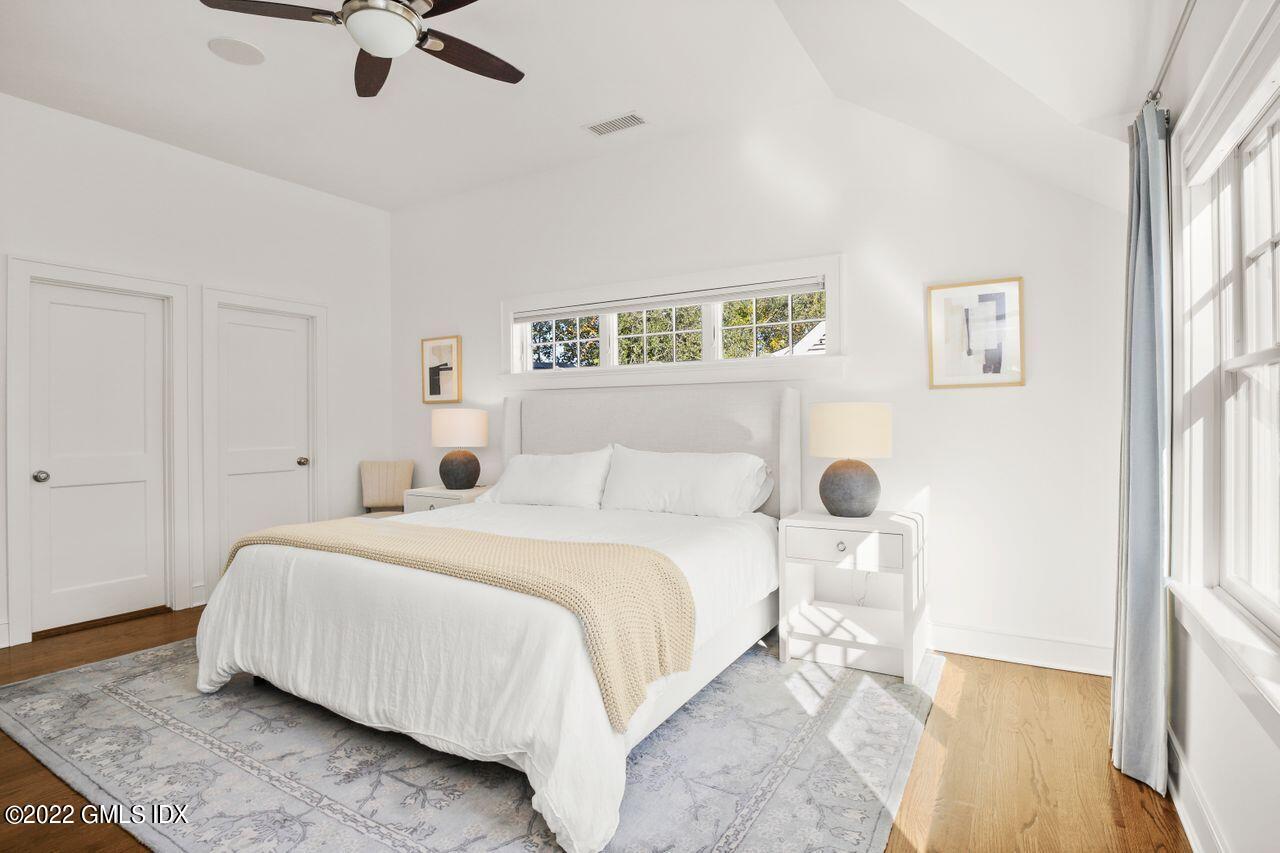 6 Ernel Drive Riverside, CT 06878 - Photo 13 of 26 a bedroom with a bed and painting on the wall