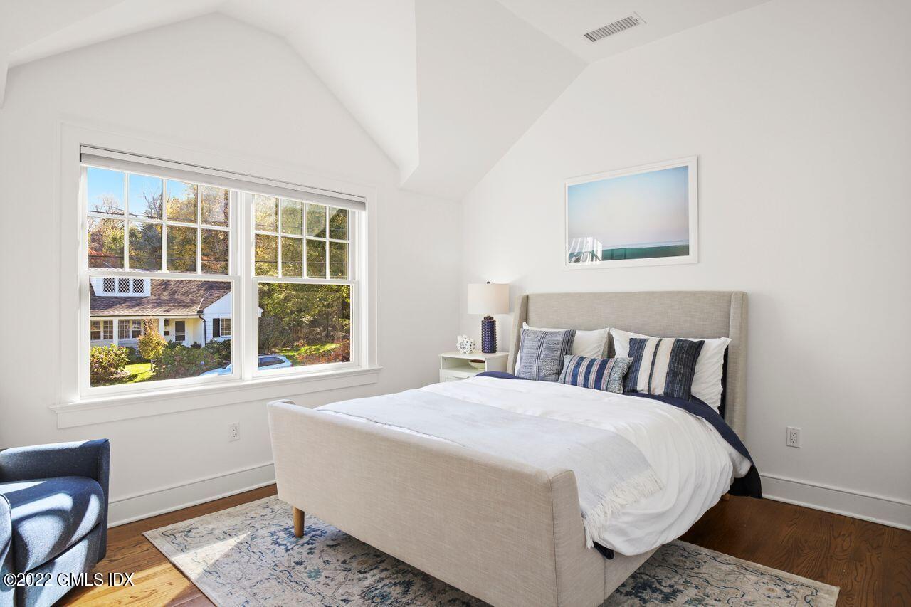 6 Ernel Drive Riverside, CT 06878 - Photo 15 of 26 a view of a bedroom with wooden floor and a window
