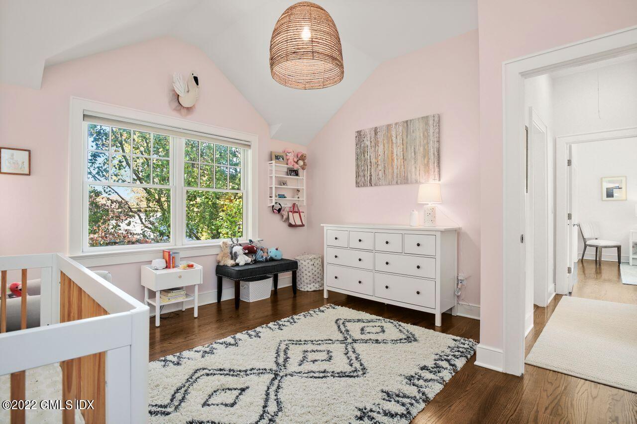 6 Ernel Drive Riverside, CT 06878 - Photo 16 of 26 a living room with furniture and a wooden floor