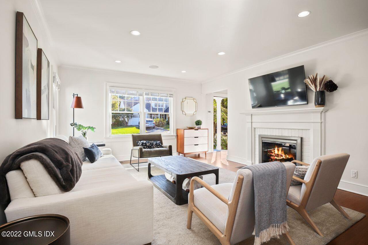 6 Ernel Drive Riverside, CT 06878 - Photo 3 of 26 a living room with furniture and a fireplace