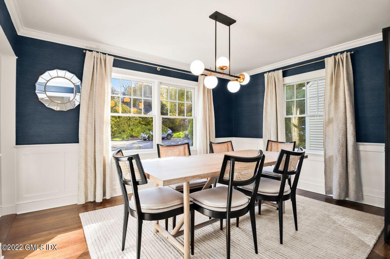 6 Ernel Drive Riverside, CT 06878 - Photo 8 of 26 a view of a dining room with furniture window and outside view