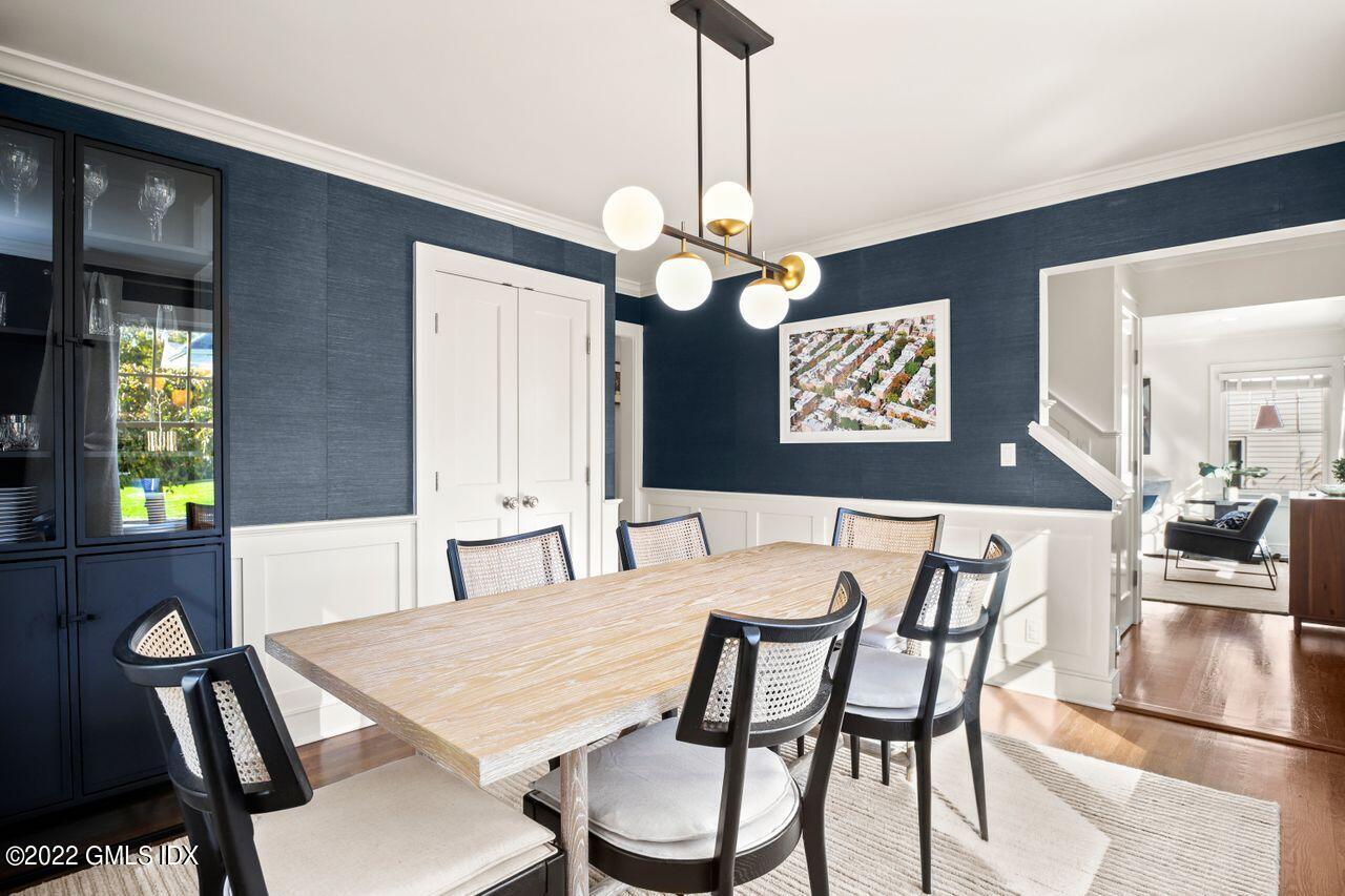 6 Ernel Drive Riverside, CT 06878 - Photo 9 of 26 a view of a dining room with furniture and chandelier