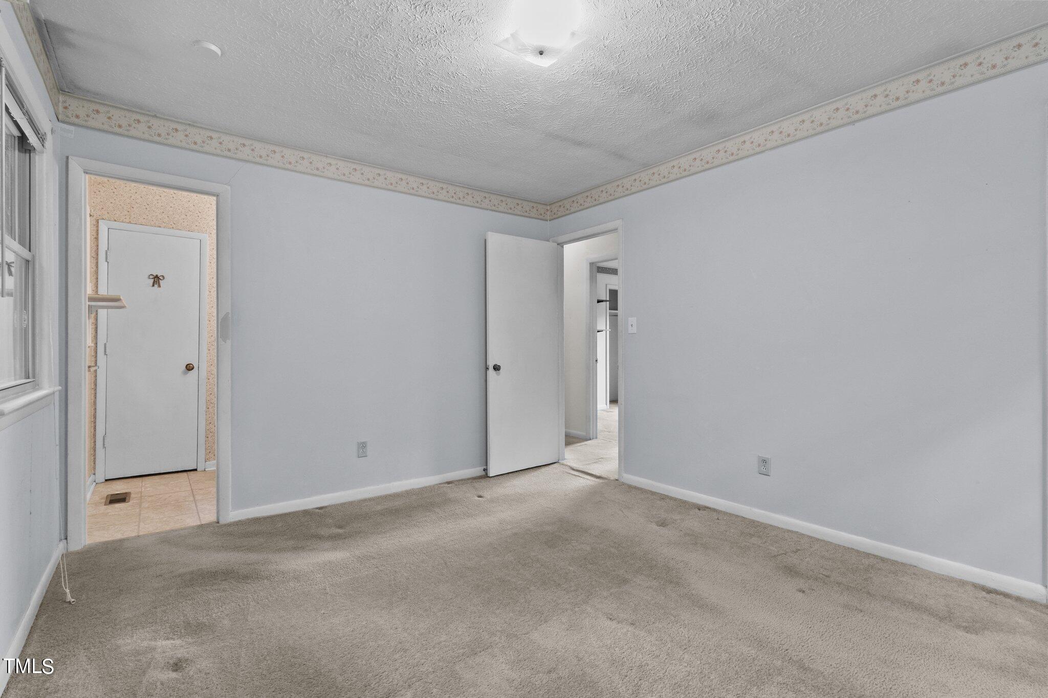 4998 Stewart Road Wade, NC 28395 - Photo 20 of 38 a view of an empty room