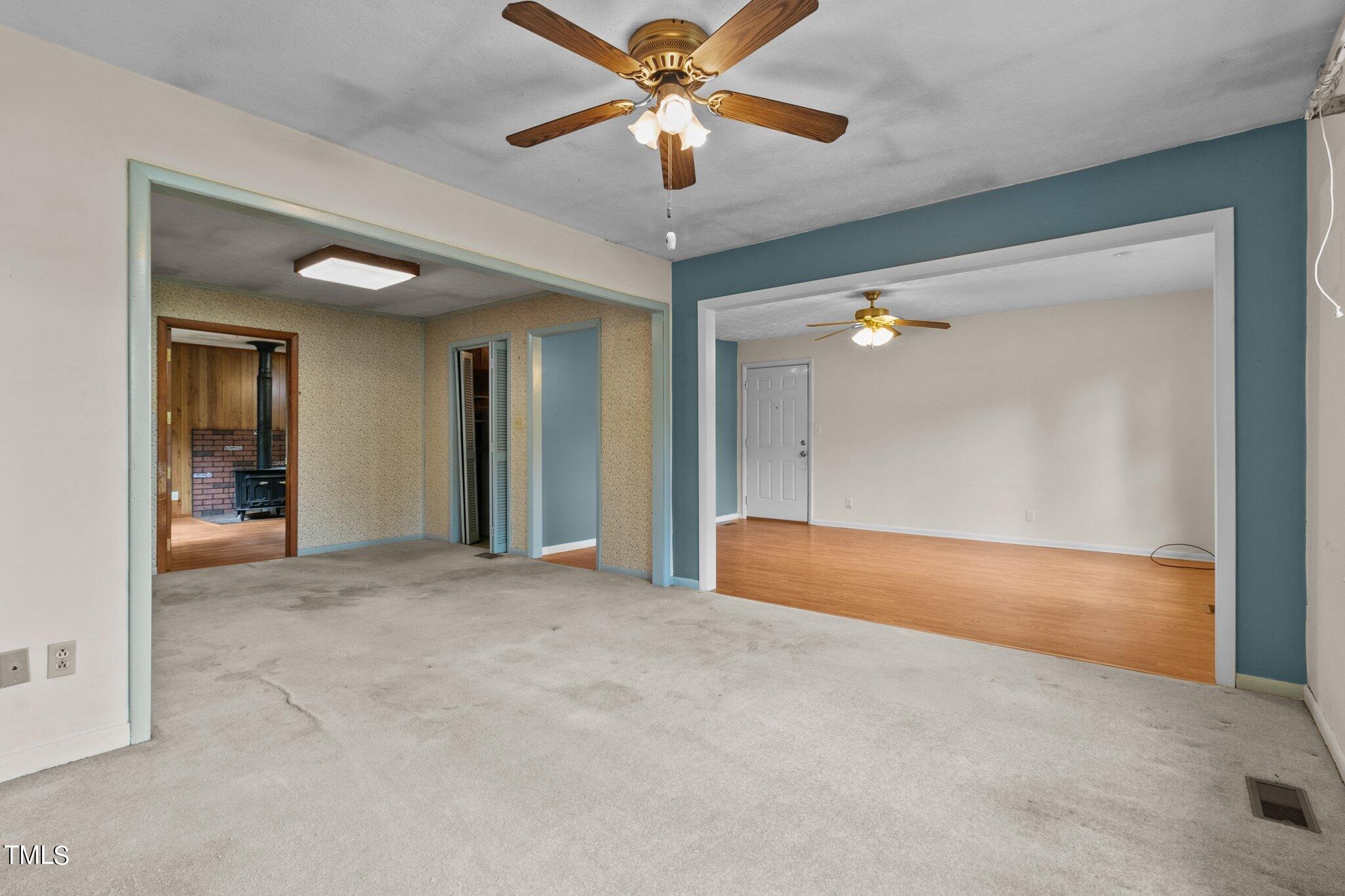 4998 Stewart Road Wade, NC 28395 - Photo 6 of 38 a view of empty room with a ceiling fan