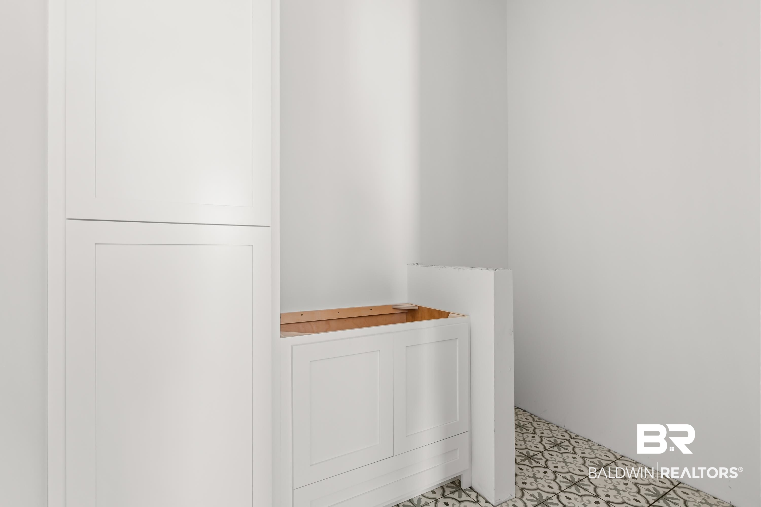 14686 State Highway Gulf Shores, AL 36542 - Photo 22 of 44 Bathroom with tile patterned floors