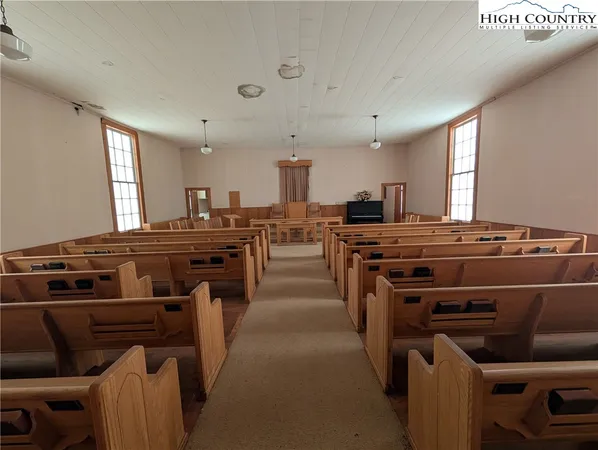 a kitchen with a stove and a refrigerator