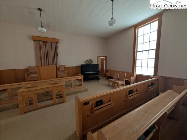 a room with furniture and windows