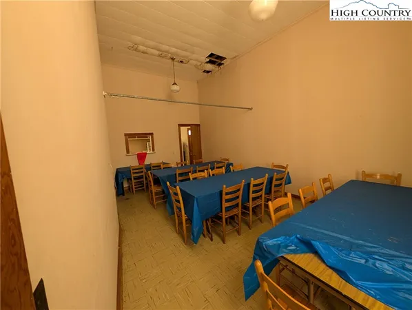 a view of a workspace with furniture