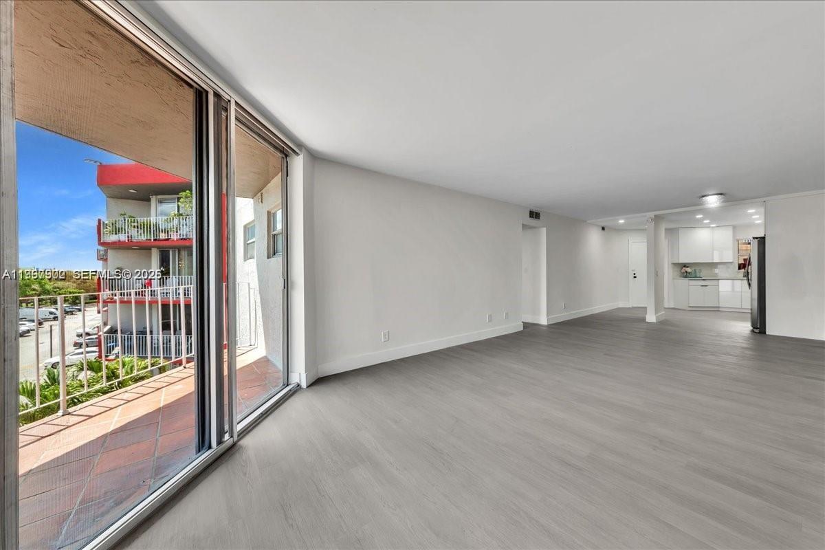 1750 West 46th Street, Unit 433 Hialeah, FL 33012 - Photo 19 of 27 a view of a big room with windows