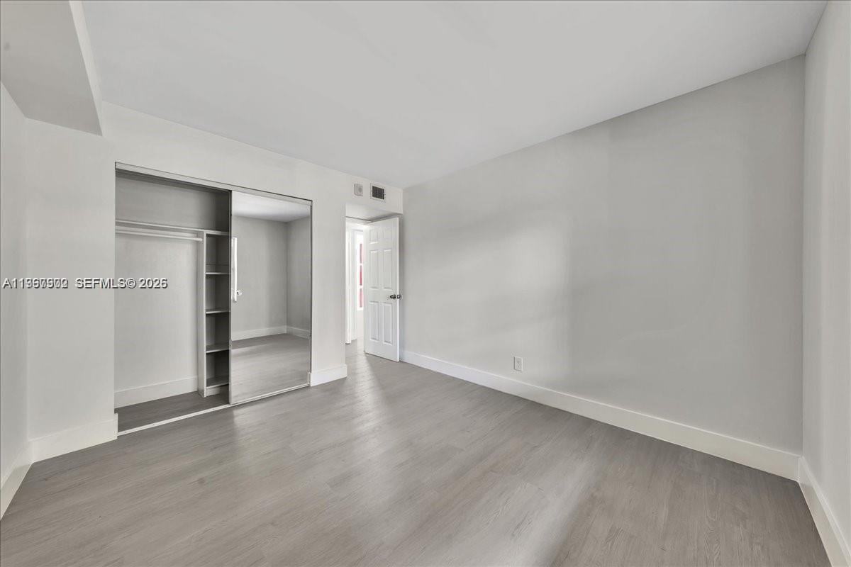1750 West 46th Street, Unit 433 Hialeah, FL 33012 - Photo 10 of 27 a view of an empty room