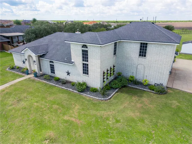 a bed room with a bed and a television