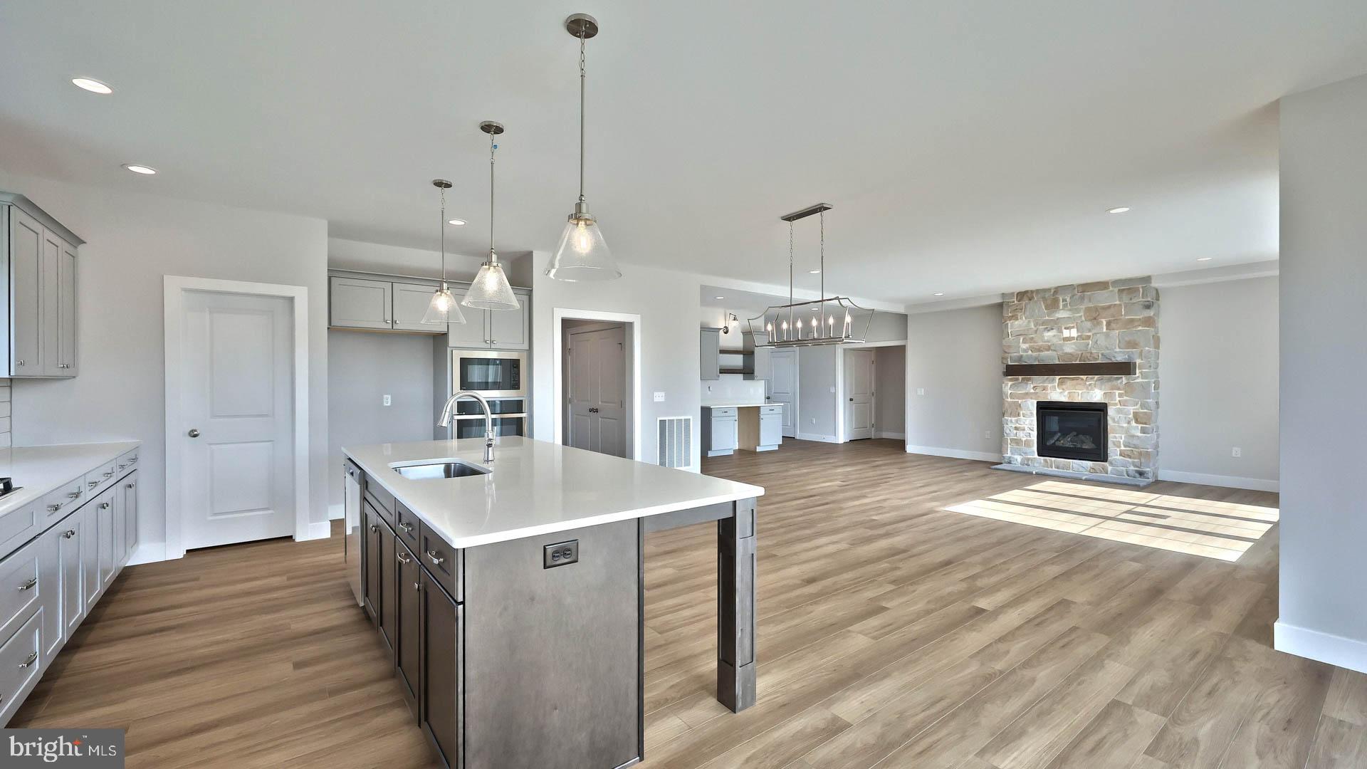 821 Sunset Boulevard Annville, PA 17003 - Photo 11 of 36 a large kitchen with sink a refrigerator and a stove