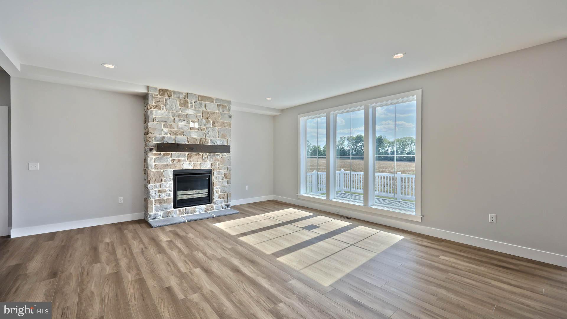 821 Sunset Boulevard Annville, PA 17003 - Photo 14 of 36 a view of an empty room with a fireplace and a window