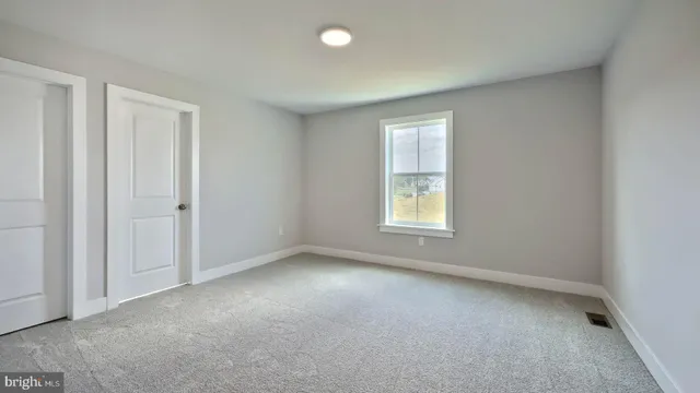 an empty room with a window