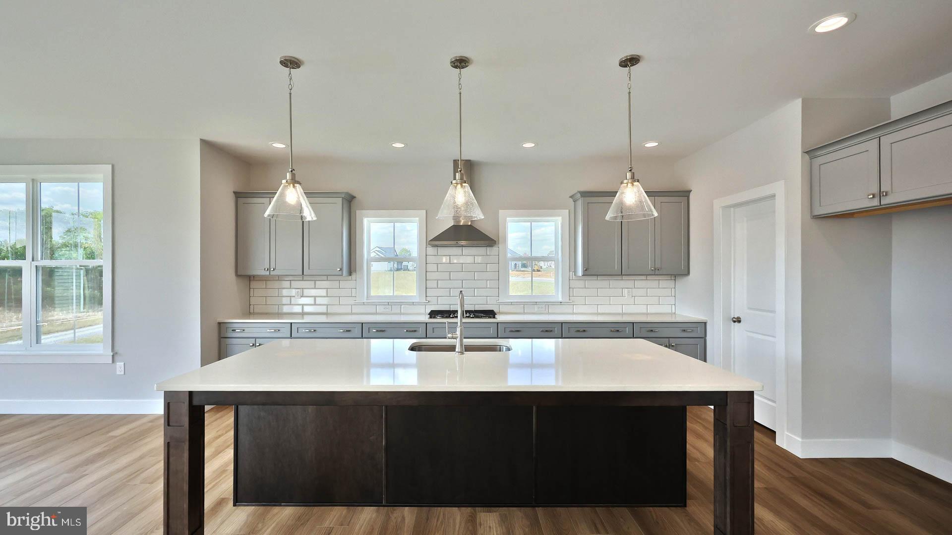 821 Sunset Boulevard Annville, PA 17003 - Photo 7 of 36 a kitchen with a sink a counter space appliances and cabinets
