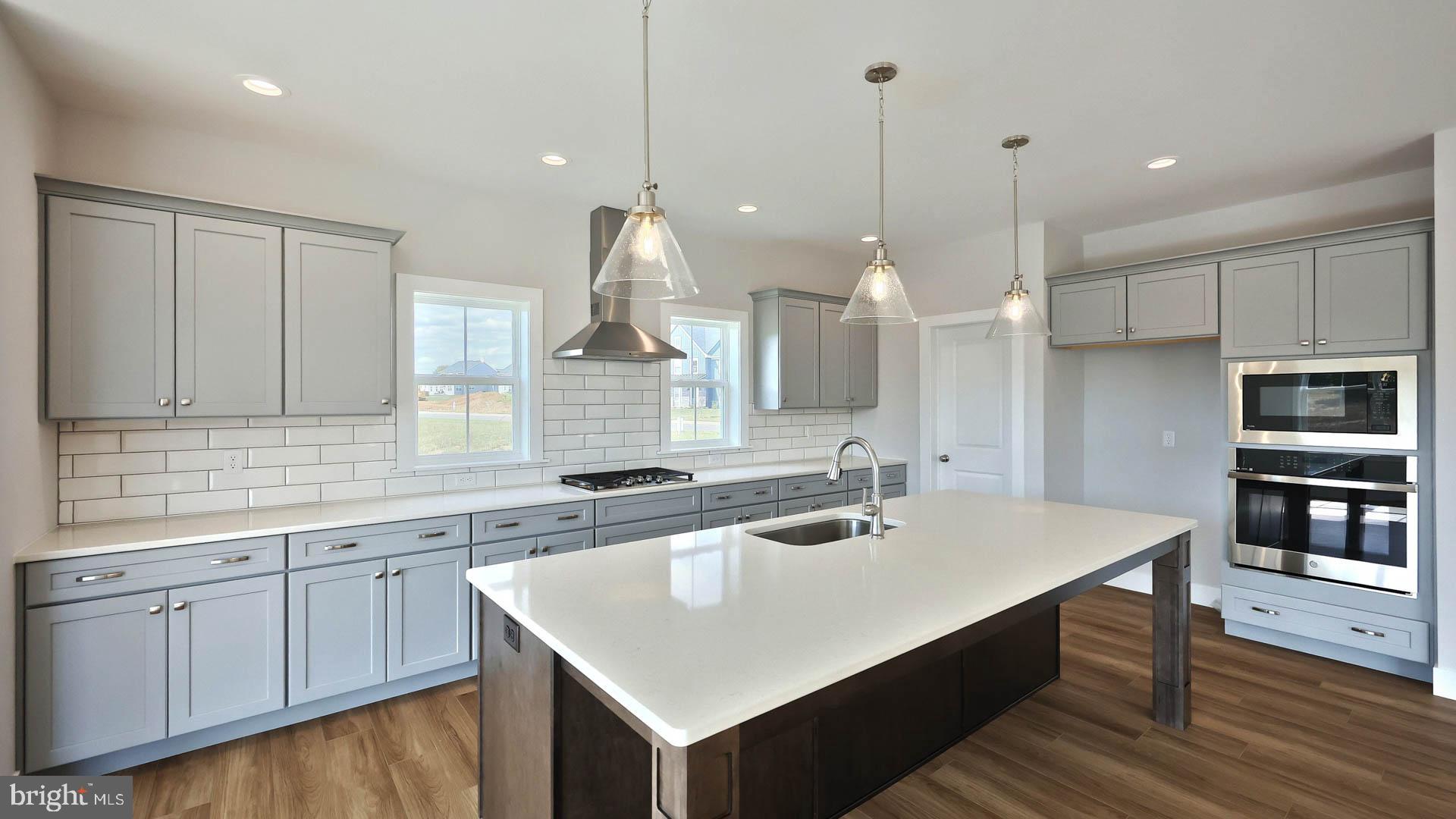 821 Sunset Boulevard Annville, PA 17003 - Photo 8 of 36 a kitchen with a sink a counter space appliances and cabinets